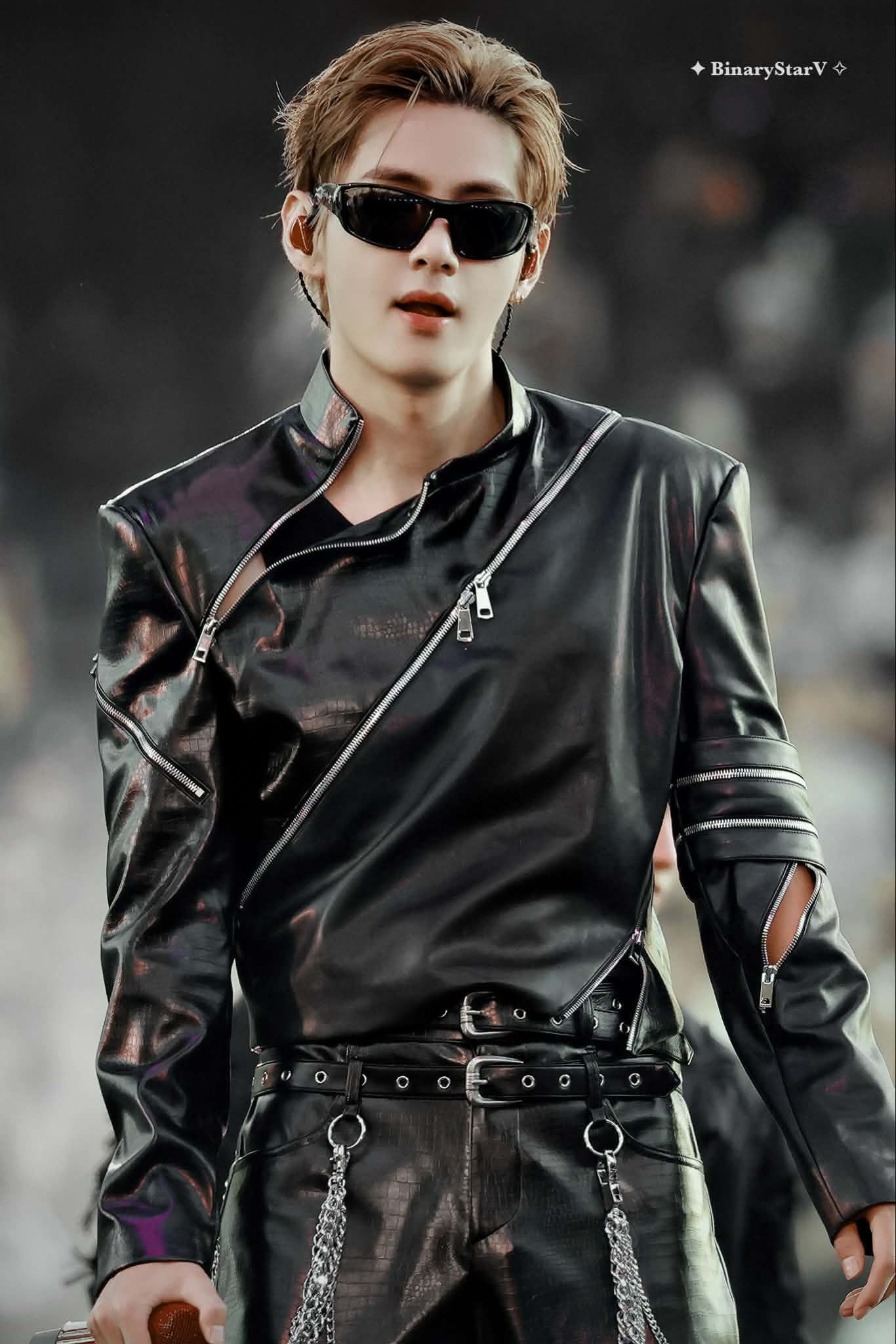 Taehyung in a black leather outfit