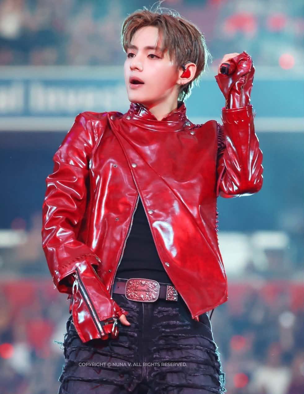 Taehyung in a red performance outfit